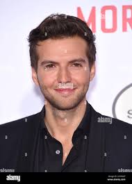 Guy attending hi-res stock photography and images