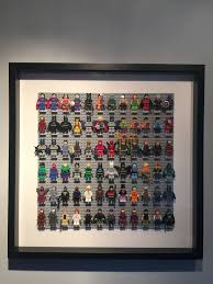 This Is A Display Frame For My Lego Super Hero Minifigures Collection That I Put Together Using A Lego Base Plate Lego Inverted Roof Lego Frame Lego Diy Frame
