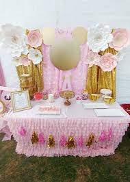 The gold minnie mouse was surrounded by gorgeous pink flowers and drapery. Pink Gold Minnie Mouse Decorations Novocom Top