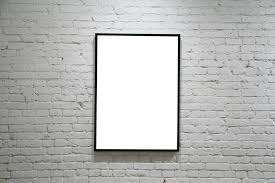 Black and white plastic bottles on wooden table on brick wall background. One Black Frame On White Brick Wall Borgen