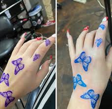 Butterfly Tattoo In 2020 Cute Hand Tattoos Blue Ink Tattoos Tattoos