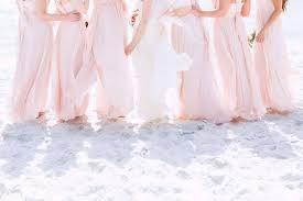 Mismatching peachy pink maxi bridesmaid dresses for a bright and cheerful tropical beach wedding. Colors Wedding Pink And Yellow Simple Beach Wedding Pink Bridesmaid Dresses