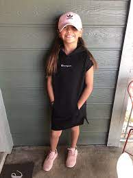 Black Champion Sweater Dress From Kids Footlocker Paired With A Pink Adidas Hat And Shoes Black Champion Sweater Champion Sweater Clothes