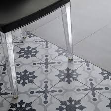 Black And White Porcelain Tile Floor The Cementine Black And White Series Is A Porcelain That Provides The Charm And Elegance Of A Vintage Effec White Porcelain Black And White Tiles Tile Patterns