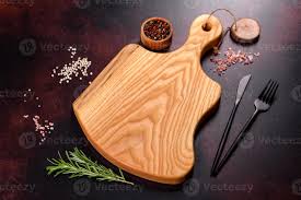 Here are the 5 best cutting boards in 2021 common cutting board materials Cutting Board With Salt Spices And Herbs On A Dark Concrete Background 2887984 Stock Photo At Vecteezy