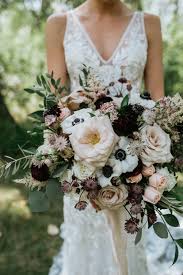 2 bridesmaids bouquet with burgundy, navy, ivory, blush, red ad green color flowers. Calgary Wedding Flowers Florist Pine For Cedar Plum Navy Downtown Wedding
