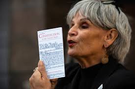 Photos from a rally outside of Congressman Michael Cloud's office