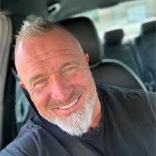 Paul 'Baz' Barrett, a Colour Sgt in the Royal Marines, stood