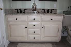 Distressing is a technique that requires either rough sanding or scarring an existing finish or applying an antiquing compound to the surface of the cabinet. Antiqued Distressed Bathroom Vanity Distressed Bathroom Vanity Bathroom Vanity Inexpensive Bathroom Vanity