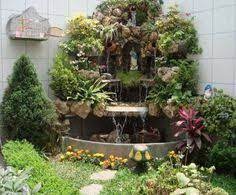 Maintenance and design are key aspects of any thriving fish pond and with the right care you can craft a stunning retreat in your own backyard. 31 Grotto Designs Ideas Grotto Design Grotto Marian Garden