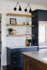 Traditional farmhouse kitchen with navy island and turquoise backsplash tiles. 1001 Ideas For A Modern Farmhouse Kitchen Decor