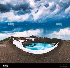 Drammatic view of the lake with turquoise water in vulkano crater.  Geothermal valley Leirhnjukur, Myvatn lake, Krafla, Iceland. Famous tourist  attraction Stock Photo - Alamy