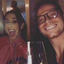 Stacey Solomon shows off bare baby bump as she cuddles up to sons in sweet  photo shared by boyfriend Joe Swash