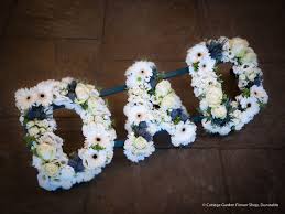 Lots of flowers add to the look. Dad Tribute Cottage Garden Dunstable
