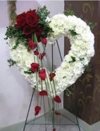 Surprising your favorite people for 110 years. Red Rose Open Heart In Augusta Ga Annie S Floral Boutique In 2021 Funeral Flower Arrangements Funeral Floral Arrangements Funeral Floral