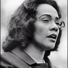 Coretta Scott King plays piano and sings with her children Yolanda, Marty,  Dexter and Bernice at home after church in 1964.