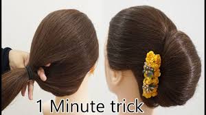 A coiffure for women in which the hair is combed back from the face and arranged in a vertical roll on the back of the head. French Bun Hairstyle Trick French Twist Hairstyle French Roll Hairstyle Youtube French Roll Hairstyle Roll Hairstyle Bun Hairstyles