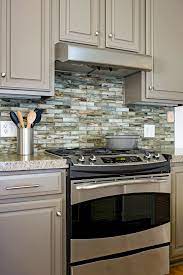 A neutral color palette such as the one in this kitchen backsplash can warm up a sleek, contemporary space. 48 Beautiful Kitchen Backsplash Ideas For Every Style Better Homes Gardens