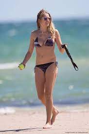 Pin on Celebrities & Beach Fashion