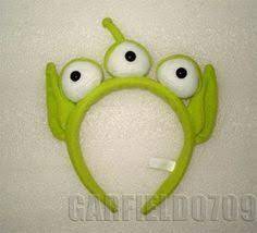 Wish I Could Find This Headband Or One With Just The Ears Antenna For My Green Ali Toy Story Alien Costume Teacher Halloween Costumes Maleficent Costume Kids