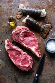 You might be thinking that making lobster at home is no easy feat, but you'd be wrong. Steak And Lobster With Spicy Roasted Garlic Chimichurri Butter Hbh