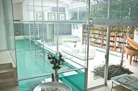 a custom made glass swimming pool designer paxton locher architects indoor swimming pools houses for sale london dream house