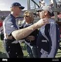 After the game, head coach Jason Garrett hugged quarterback Tony ...