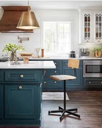 Smooth finish · design expertise · legendary quality We Re All About Those Navy Cabinets Bold Colors Are Making A Comeback This Year And We Couldn T Be Ha Kitchen Remodel Kitchen Design Blue Kitchen Cabinets