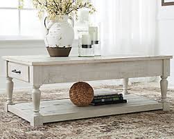 Carynhurst coffee table with lift top. 2 Drawers Coffee Tables Ashley Furniture Homestore