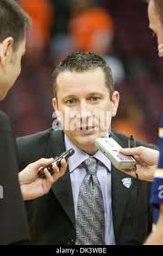 Bowling Green basketball coach Curt Miller disputes a call with referee  Lisa Mattingly during the first half of the game against Oklahoma State in  an NCAA women's first-round college basketball game in