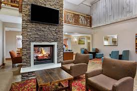 Business guests enjoy the free breakfast. La Quinta Inn Suites Blue Ridge Parkway
