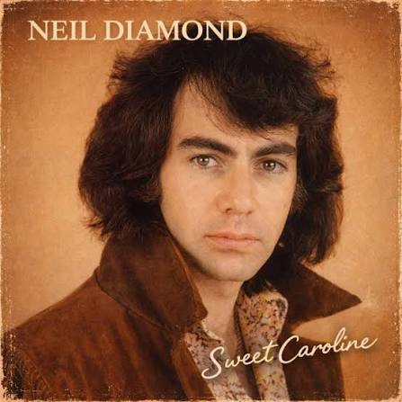 🎵 Neil Diamond – Sweet Caroline 📀 Released: 1969 📌 Label: Uni Records “Sweet Caroline” is pure feel-good magic — the kind of song that fills stadiums, wedding halls, and bars around
