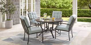 Enjoy your meals with a side of sun and warm breeze at a modern outdoor dining table. Round Outdoor Patio Dining Sets