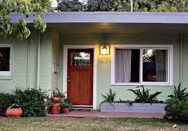 They glitter in the sun and i do believe i have the most interesting and beautiful yard in our. Concrete Block House Makeover Wow Home Exterior Makeover House Exterior Cinder Block House