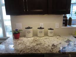 Simple Backsplash For Bianco Antico Countertops With Dark Cabinets Crossville Porcelain Ti Granite Kitchen Delicatus Granite Backsplash Kitchen Dark Cabinets