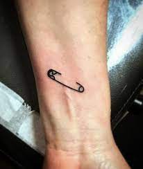Small Wrist Tattoos With Powerful Meanings Small Wrist Tattoos Wrist Tattoos Girls Minimal Tattoo