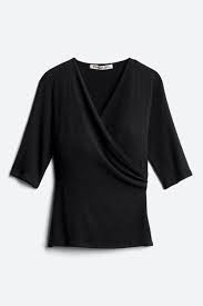 Simple and sleek faux wrap tops layer extremely well under blazers and jackets. Michael Stars Anne Fitted Faux Wrap Knit Top 98 Stitch Fix Fall Clothes Knit Top