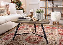 Find out how you can turn secondhand items discovered at yard sales and thrift stores into a stylish and functional focal point for your living room. How To Style A Coffee Table Tabletop Decor Ideas Living Spaces