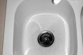 how to clean a white cast iron sink