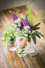 Pin By Ashley Scotto On Wedding Ideas Rustic Flower Arrangements Wedding Floral Centerpieces Wedding Centerpieces