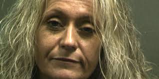 Officials: Woman wanted for theft of property