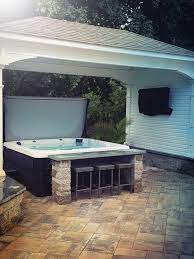 Hot tub landscaping ideas surround with rocks. Hot Tub Enclosures To Inspire Your Backyard Makeover Master Spas Blog