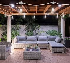 Create the perfect outdoor dining space for summer dinner parties with a few strands of string lights. Indoor Outdoor String Lights White Pottery Barn