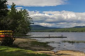 Mom will sleep in a tent and cook over a fire but insists on having a shower!!! Webb Beach Mount Blue State Park See Swim