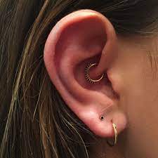 5 Piercings That Are Going To Be Huge This Year Plus 2 Ways To Upgrade Your Old Ones Daith Piercing Ear Piercings Body Piercings