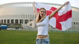 England fans go crazy after world cup victory over sweden. A Woman With A Big Flag Of England Football Fan Of England Against The Background Of The Stadium Video By C Polevoi Stock Footage 174295800
