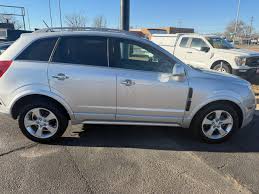 Image result for Silver Topaz 2013 Captiva