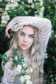 Legend of blue eyes white dragon. Young Beautiful Woman With Grey Hair And Blue Eyes In White Flowers By Maja Topcagic Stocksy United