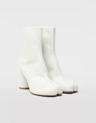 Throughout his career margiela opted for anonymity, seldom making public appearances and consistently refusing to grant interviews. Maison Margiela Tabi Hologram Ankle Boots Women Maison Margiela Store