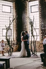 Natural Industrial Wedding At The Np Event Space Junebug Weddings Industrial Wedding Wedding Ceremony Backdrop Industrial Wedding Venues